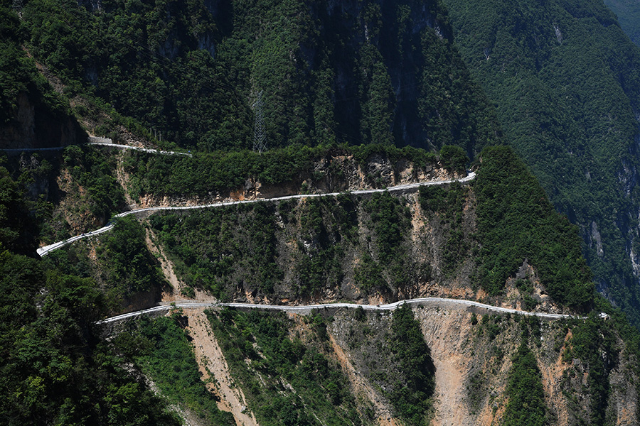 Villagers create path to prosperity by carving out mountain road