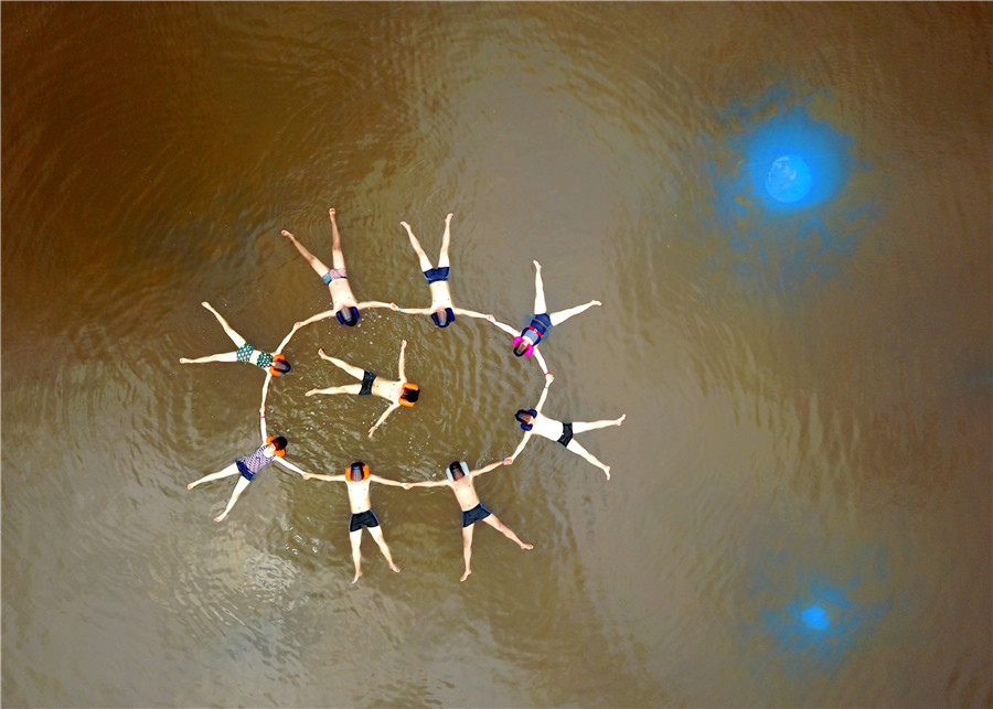 Swimmers float in 'Dead Sea' in Dalian