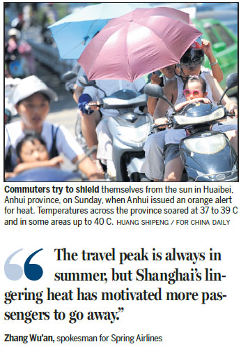 East swelters while rains lash south