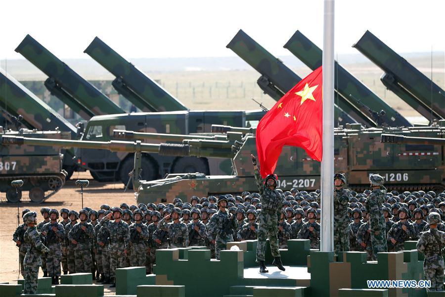 Xi inspects troops as China's military might on show