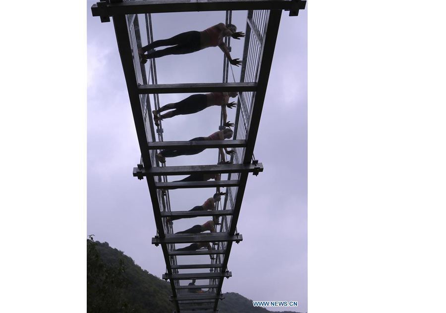 Yoga practiced on suspension bridge