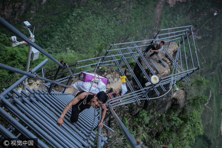 Photographer's work changes life of 'cliff village'