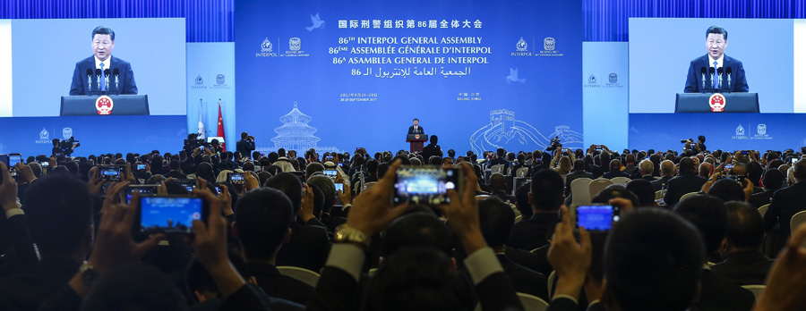 Xi pledges to help strengthen Interpol