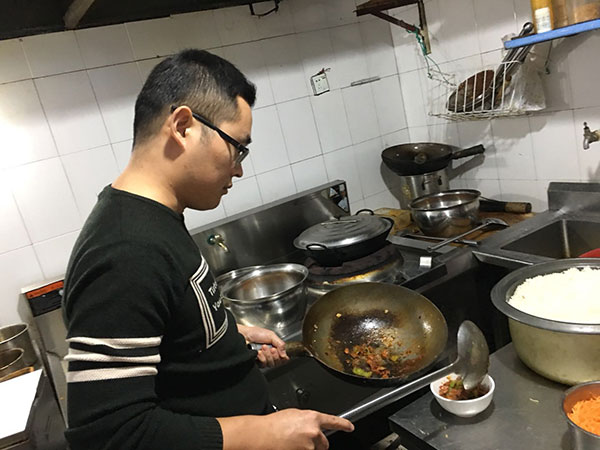 Chinese man serves feeling of home, friendship in Indian restuarant