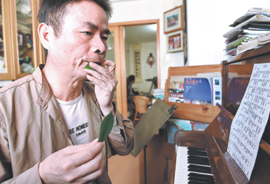 Making music by blowing on leaves