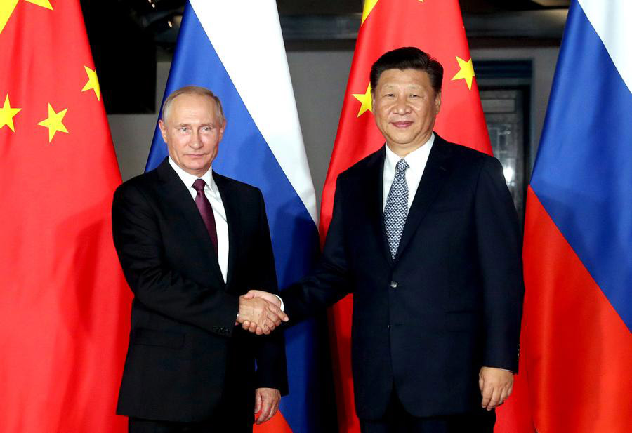 President Xi meets his Russian counterpart Putin