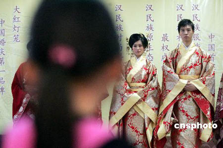 Traditional wedding costumes shown in Beijing