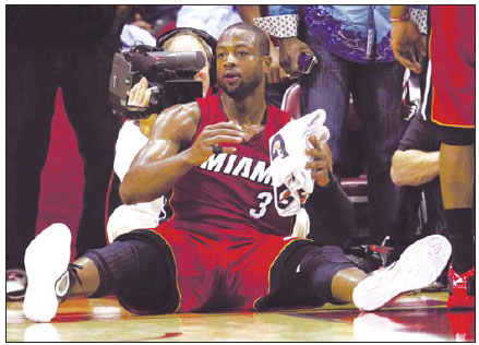 Wade scores 45 in Heat's 125-119 victory over Rockets
