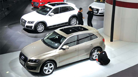 Audi raises ambitious three-year goal