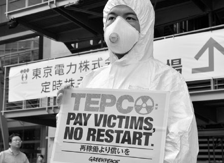 TEPCO shareholders demand end to nuclear power in Japan