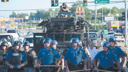 Police fire stun grenades at Missouri protesters