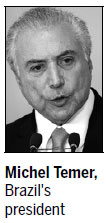 Temer clings to power after vote