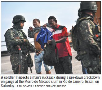 Brazil troops storm Rio slums in bid to catch gang leaders