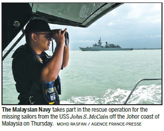 Body found by Malaysia not one of McCain's 10 missing