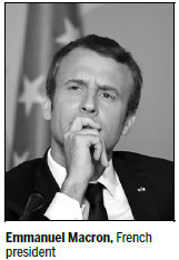 Macron defends raft of 'ambitious' reforms