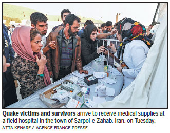 Iran scrambles to aid quake victims