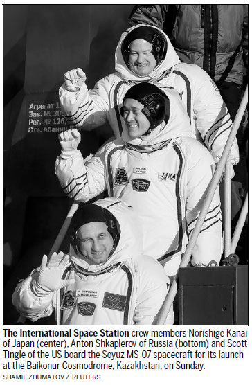 Two rookie astronauts, cosmonaut blast off to ISS