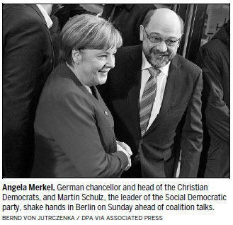 Merkel strikes note of optimism for grand coalition