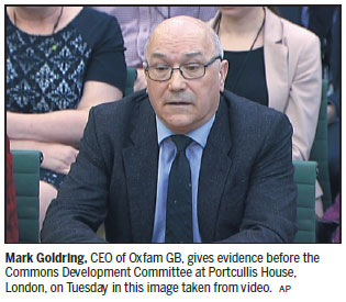 Oxfam boss sorry for baby comments
