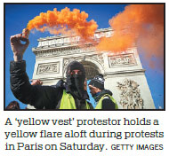 Macron condemns anti-Semitic abuse by 'yellow vests'
