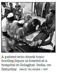 Death toll at 156 in India's toxic liquor tragedy