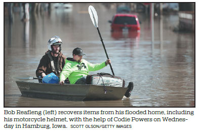 Flood costs will top $1B as US Midwest still at risk