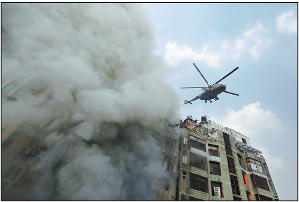 25 killed in Bangladesh skyscraper inferno as building lacks fire exits