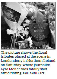 Northern Ireland police arrest 2 over killing of journalist