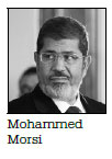 Morsi, Egypt's ousted president, buried after courtroom death