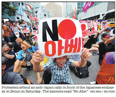 Tokyo vows actions if Seoul hurts companies in escalating dispute