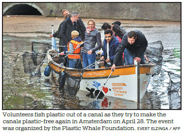 Fishing for plastics on Amsterdam's canal cruises