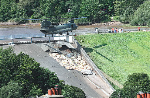 Race to ease pressure on damaged UK dam