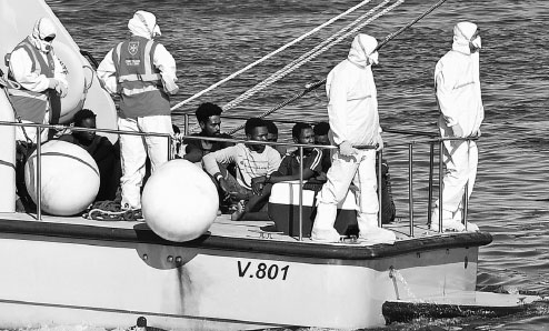 Spain offers to accept migrants from rescue ship