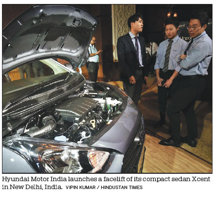 Auto companies in India halt production to tackle slowdown