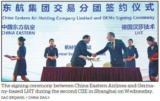 SOEs sign cooperation pacts with global firms