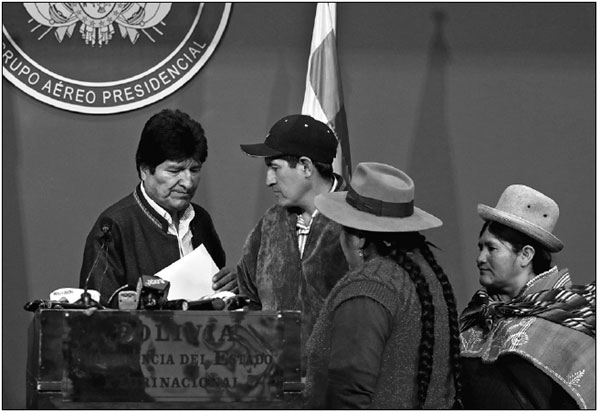 Bolivia in power void as Morales quits