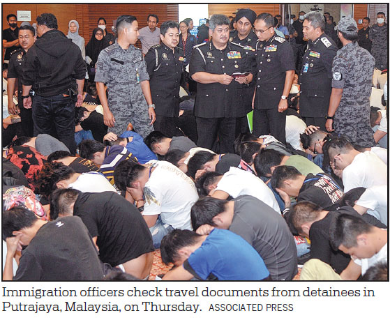 Malaysia arrests 680 over scam targeting Chinese