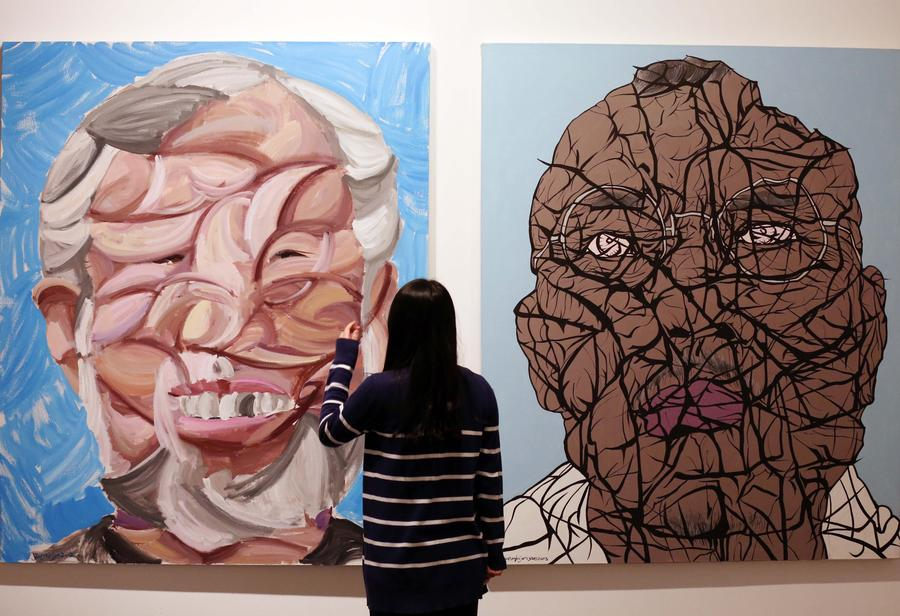 Yue's 'Big Face' art show opens in Nanjing
