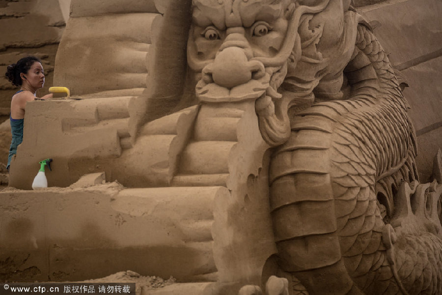 Sand sculptures replicate world heritage items