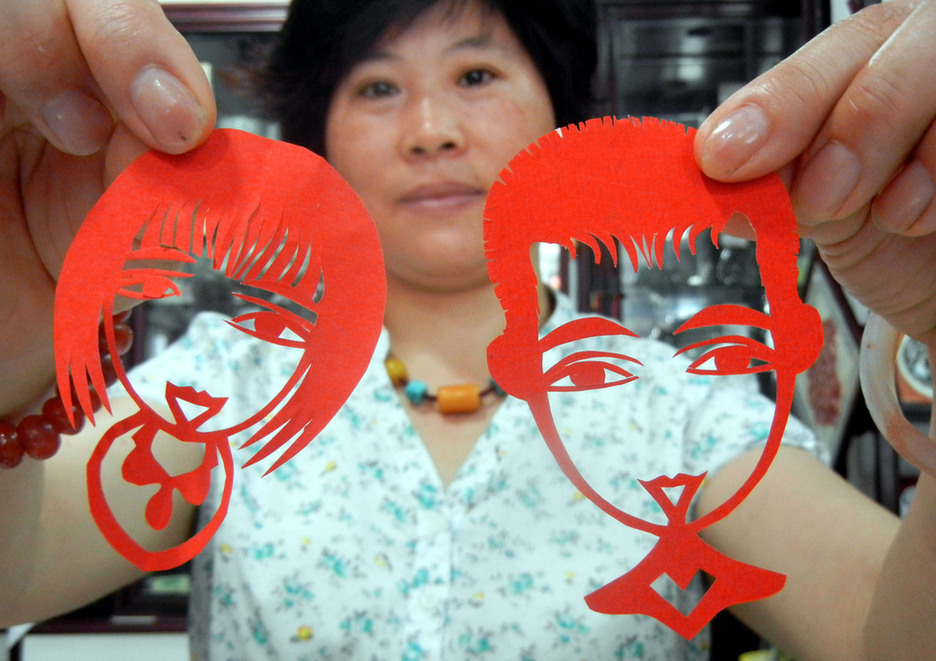 Chinese Valentine's Day embraced with paper-cuts