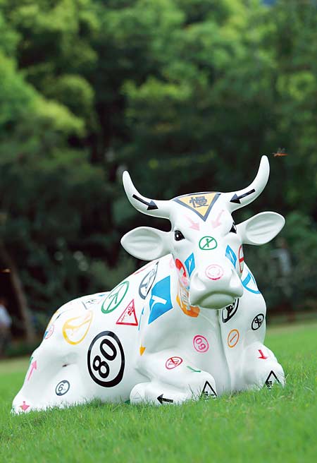 Divine decorated bovines at Shanghai Cow Parade