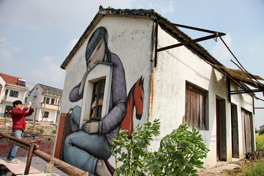 French street artist brightens up Shanghai village