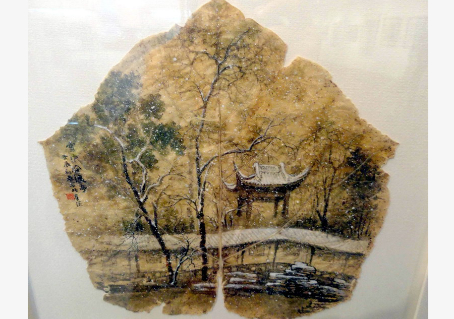 Artist creates Suzhou gardens on leaves
