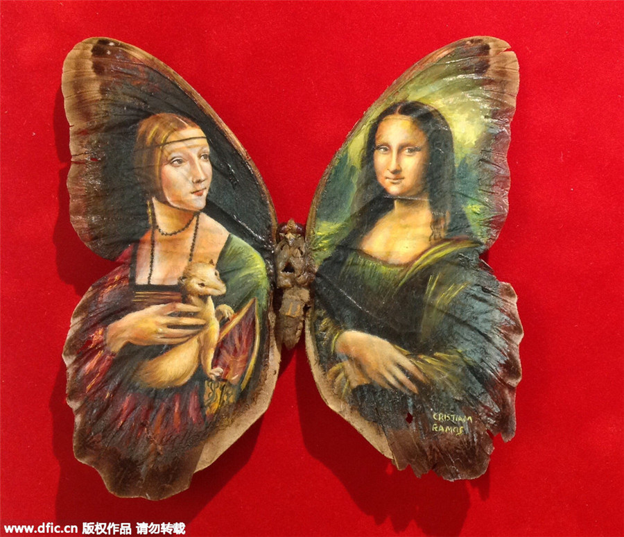 Painter uses butterfly wings as canvases