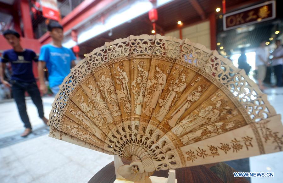 Wood art show held in Fujian