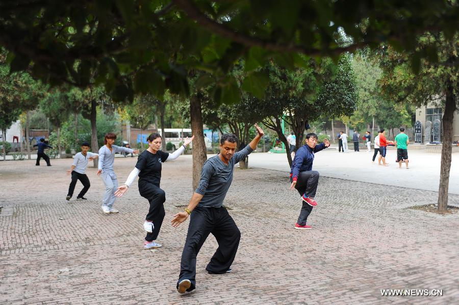 People practice tai chi in Henan