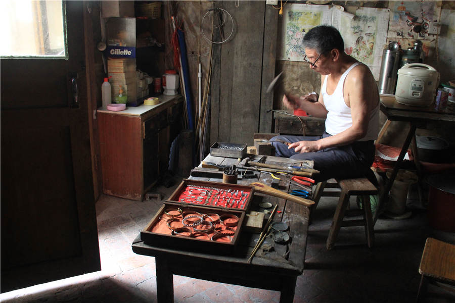 Craftsman sticks to handmade silver craft