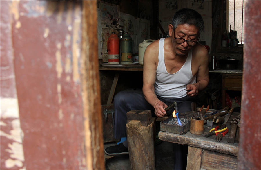 Craftsman sticks to handmade silver craft