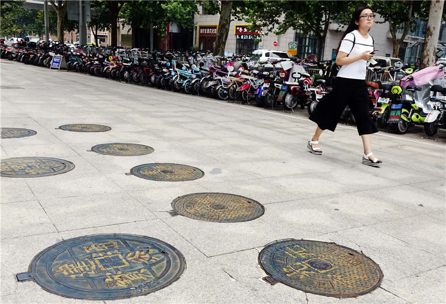 Is it a manhole cover or ancient coin?