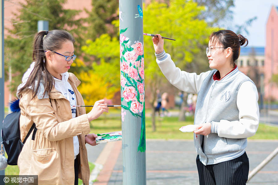 Vivid light pole drawings color campus in name of environment